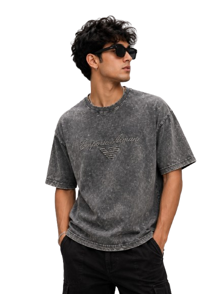 Model wearing black acid wash oversized t-shirt