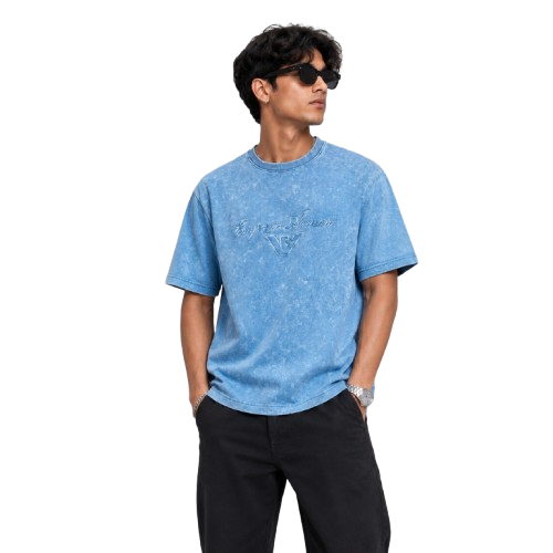 Model wearing blue acid wash oversized t-shirt
