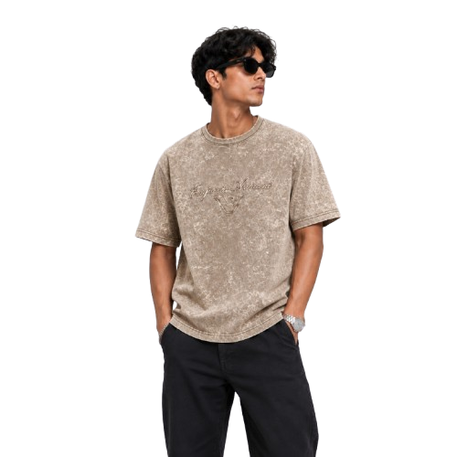 Model wearing beige  acid wash oversized t-shirt
